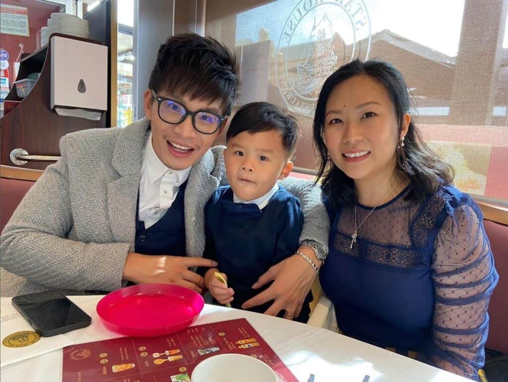 Vinh Giang's Family consisting of his wife and kid